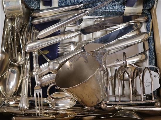A silver toastrack, a silver jug, a small quantity of assorted small silver flatware and plated flatware.